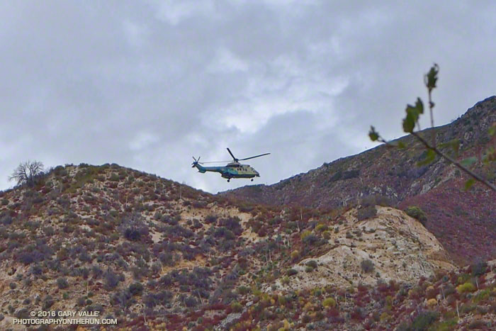 Air Rescue 5 at work again on Angeles Crest Highway. The LASD Super Puma helicopter is approaching a turnout below Red Box to airlift an injured motorcyclist.