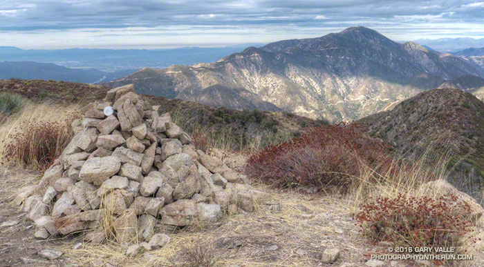 Cairn, with summit register, on Brown Mountain with Mt. Lukens in the background.
