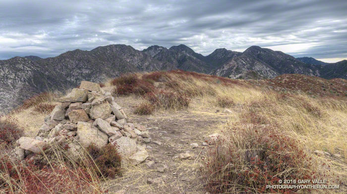 View east from the breezy summit of Brown Mountain. Peaks from left to right: Mt. Deception, Mt. Disappointment, San Gabriel Peak, Mt. Markham and Mt. Lowe.
