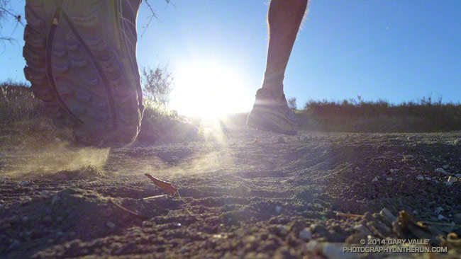 Running up a hill in the Hoka One One Mafate Speed