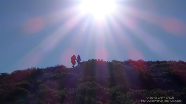 Hikers nearing the summit of Mugu Peak