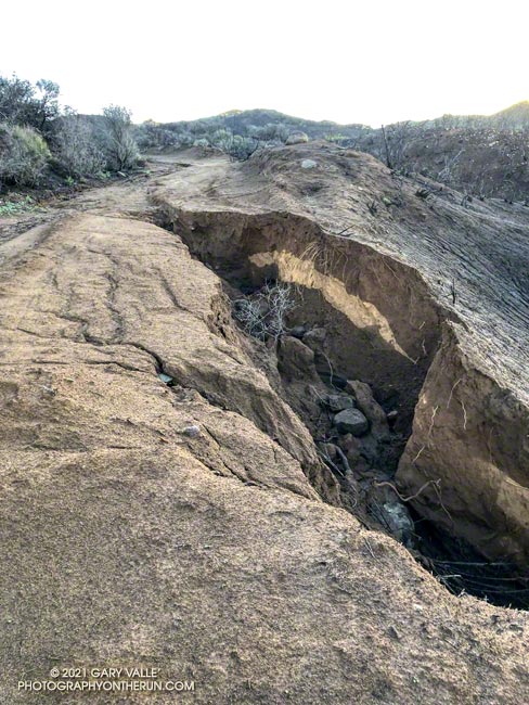 Erosion along Eagle Springs Fire Road following a series of December storms. December 26, 2021.