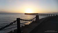 Sunrise from the Golden Gate Promenade near the Warming Hut and Fort Point Pier, also known as Torpedo Wharf.