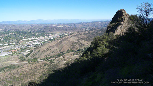 View from Ladyface across Kanan Road to Heartbreak Ridge and the Ventura Frwy. The San Gabriel Mountains are in the distance.
