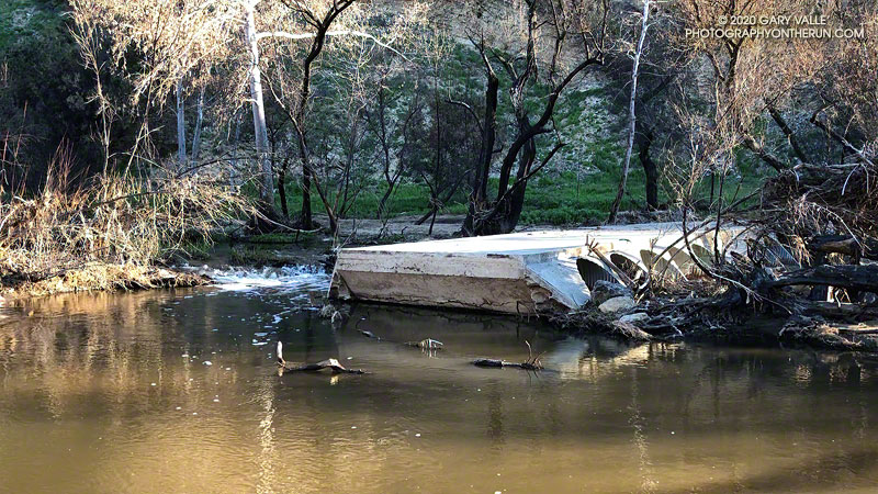 Washed-out footbridge on the Crags Road Trail between Century Lake and the M*A*S*H site. A fallen tree about 70 yards upstream is being used to cross Malibu Creek. Photo from a run on March 16, 2019.