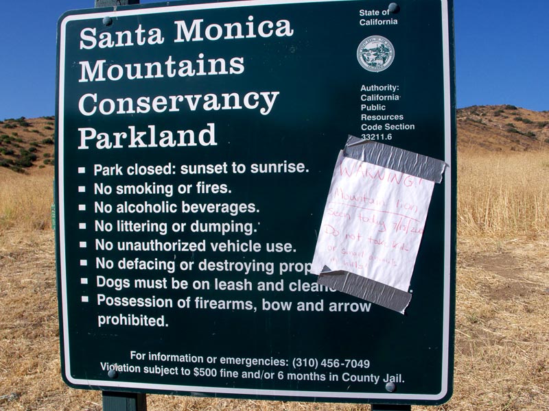 Notice posted at the Chumash Trailhead warning of a mountain lion sighting on July 18, 2008.