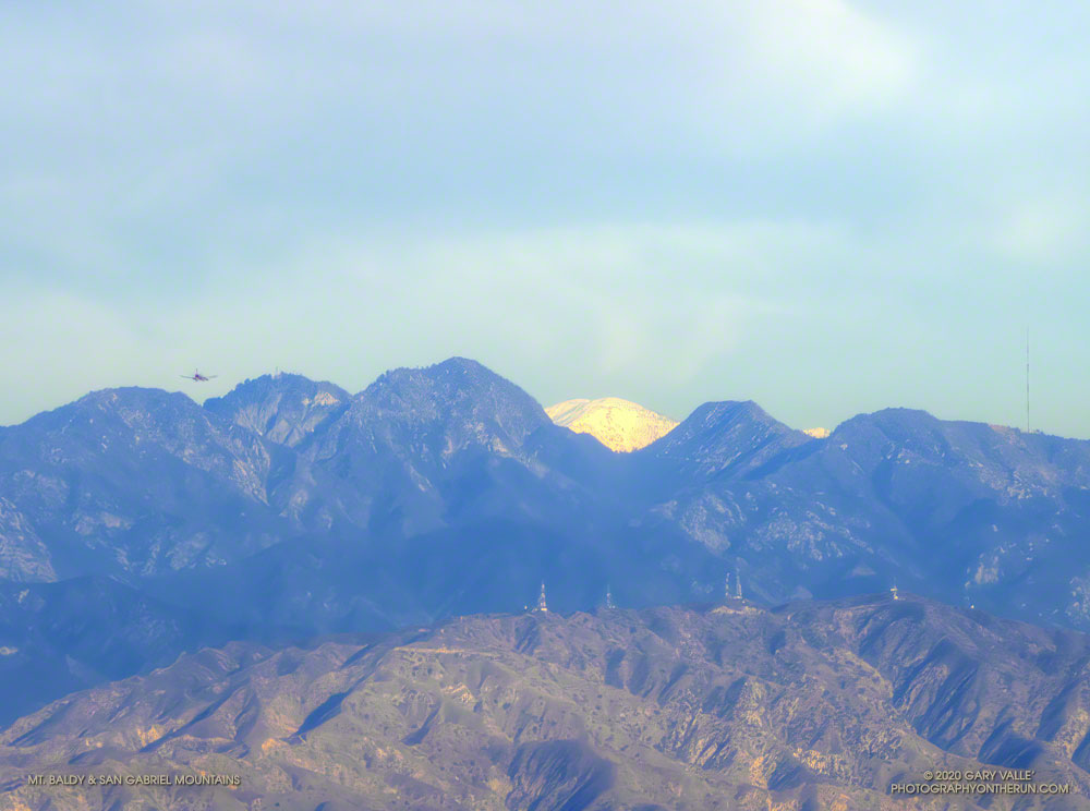 Mt. Baldy and peaks of the Front Range of the San Gabriel Mountains, photographed from Lasky Mesa in Upper Las Virgenes Canyon Open Space Preserve. From left to right: Mt. Deception, Mt. Disappointment, San Gabriel Peak, Mt. Baldy, Mt. Markham and Mt. Lowe. From this angle the view is of West Baldy (in front) and Mt. Baldy.
