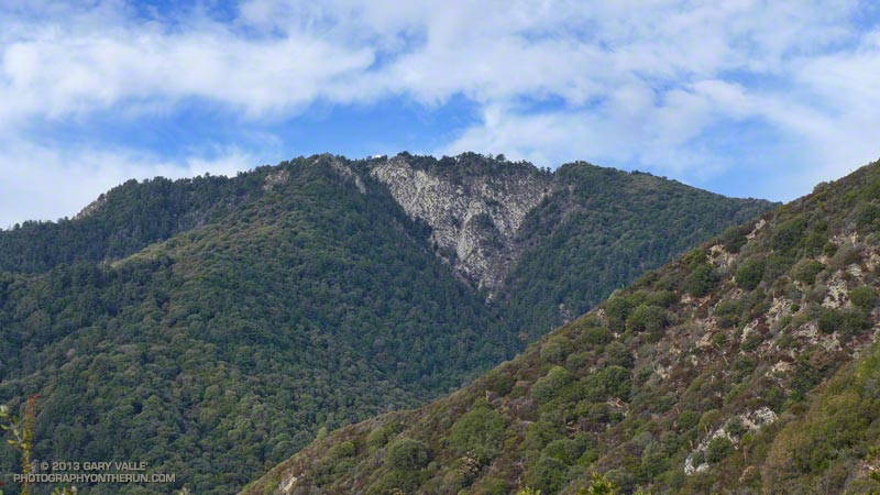 Mt. Wilson's east face from the Gabrielino Trail. The Sturtevant Trail descends the rounded ridge to the left of the rocky face, and the Rim Trail descends the ridge to the right.