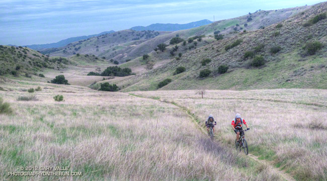 Mountain bikers cranking up a canyon near Las Virgenes Creek.