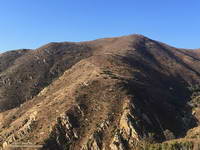 The Mugu Peak Trail starts in upper La Jolla Canyon and climbs up and around Mugu Peak.