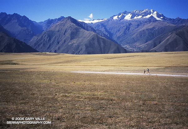 Runners on a high plateau above the Sacred Valley of the Incas.