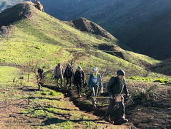 Members of the Santa Monica Mountains Trail Council (SMMTC) approaching the junction of the Old Boney and Chamberlain Trails.