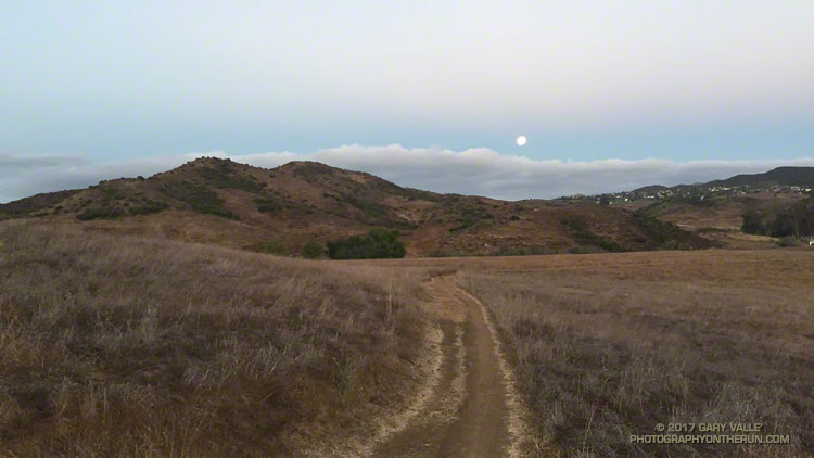 Full moon setting over Rancho Sierra Vista/ Satwiwa in Newbury Park.