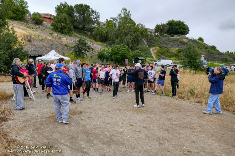 Jon assembles the group for the start of the run/walk to Lasky Mesa.