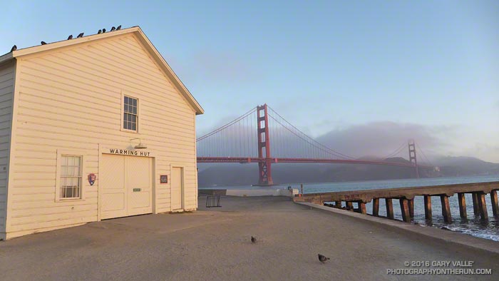 Warming Hut and Golden Gate Bridge at sunrise from the Golden Gate Promenade