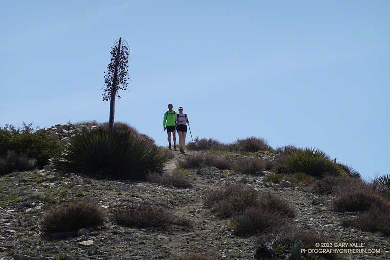 Hikers at the top of the last false summit before Condor Peak.