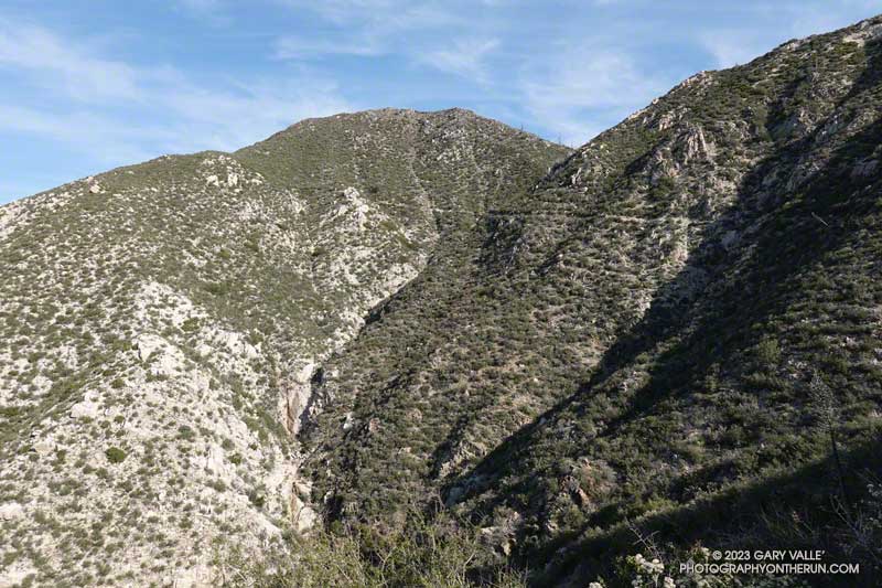 Looking up at the Condor Peak Trail as it works across the face of Fox Mountain.