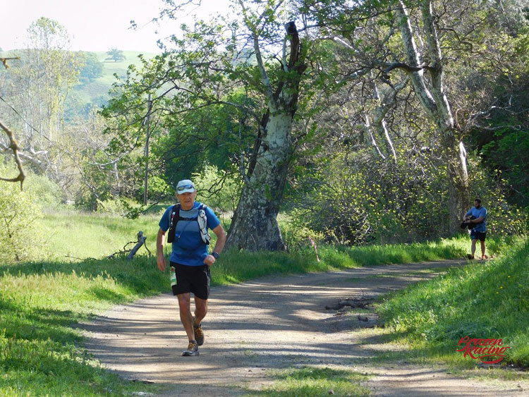 Running up Curry Canyon at about MIle 13.1. Photo courtesy of Jen and Brazen Racing. Thank you!