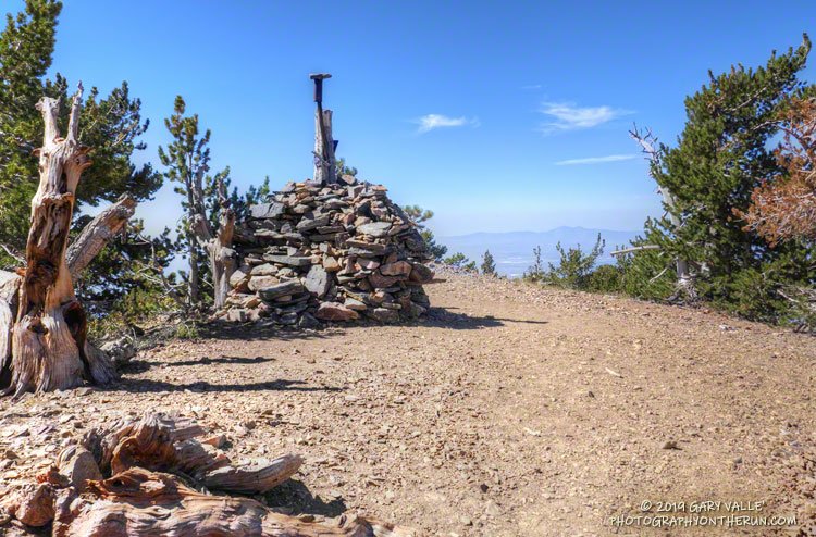 Established in 1852, the Washington Monument Initial Point was the first of three monuments on the west ridge of San Bernardino Peak that have been used to survey Southern California. For more info see Three Monuments, One Initial Point and San Bernardino Meridian.