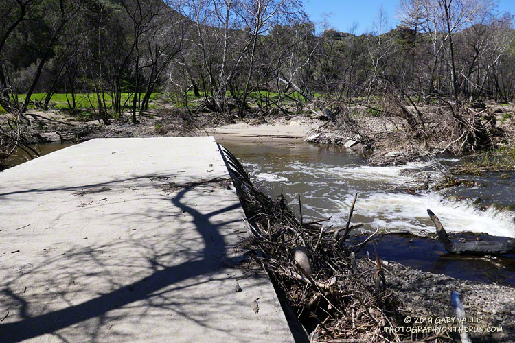 High water on Malibu Creek overran and then bypassed the footbridge on Crags Road near its junction with the Forest Trail. March 16, 2019.