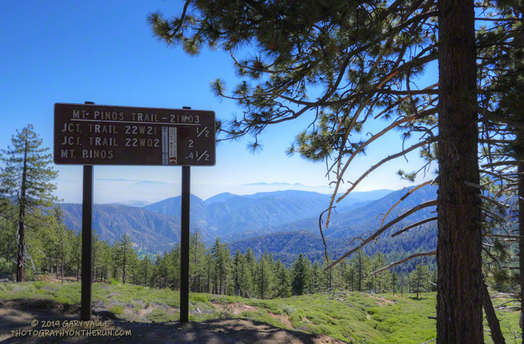 The Mt. Pinos/Vincent Tumamait Trailhead on Mt. Abel (Cerro Noroeste) Rd. The linear valley in the background is the San Andreas Fault zone.