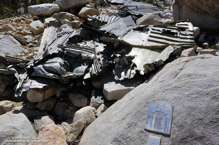 Wreckage and the memorial on the Sky High Trail to the personnel of a Douglas C-47B that crashed in a snowstorm on December 1, 1952. The C-47B "Gooney Bird" was a military version of the DC-3. Elevation about 10,380 ft.