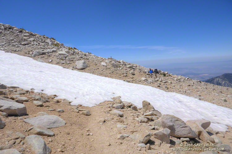 A tongue of snow at an elevation of about 11,300', near the top of the Sky High Trail . July 27, 2019.
