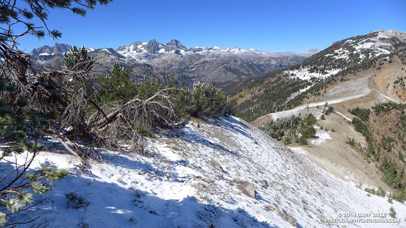 Snow-covered trail just south of Deadman Pass. The trail continues down to the pass and then up to Two Teats and San Joaquin Peak. Postcard views of the Minarets, Ritter and Banner are found all along the ridge.