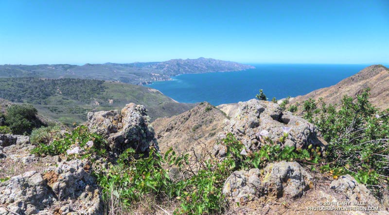 View of western Santa Cruz Island from Montañon Ridge. The rock in the foreground is volcanic. It was formed  during a geologically complex period when the Pacific-North America plate boundary was transitioning from a subduction zone to the two plates sliding laterally past each other.