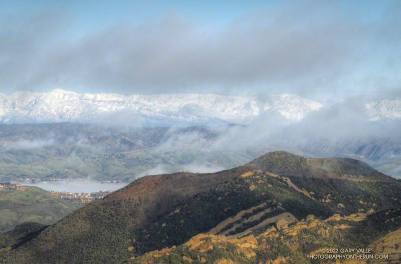 View past Calabasas Peak (2163') to snow-covered Hines Peak (6716') and the Topa Topa Mountains. February 26, 2023.